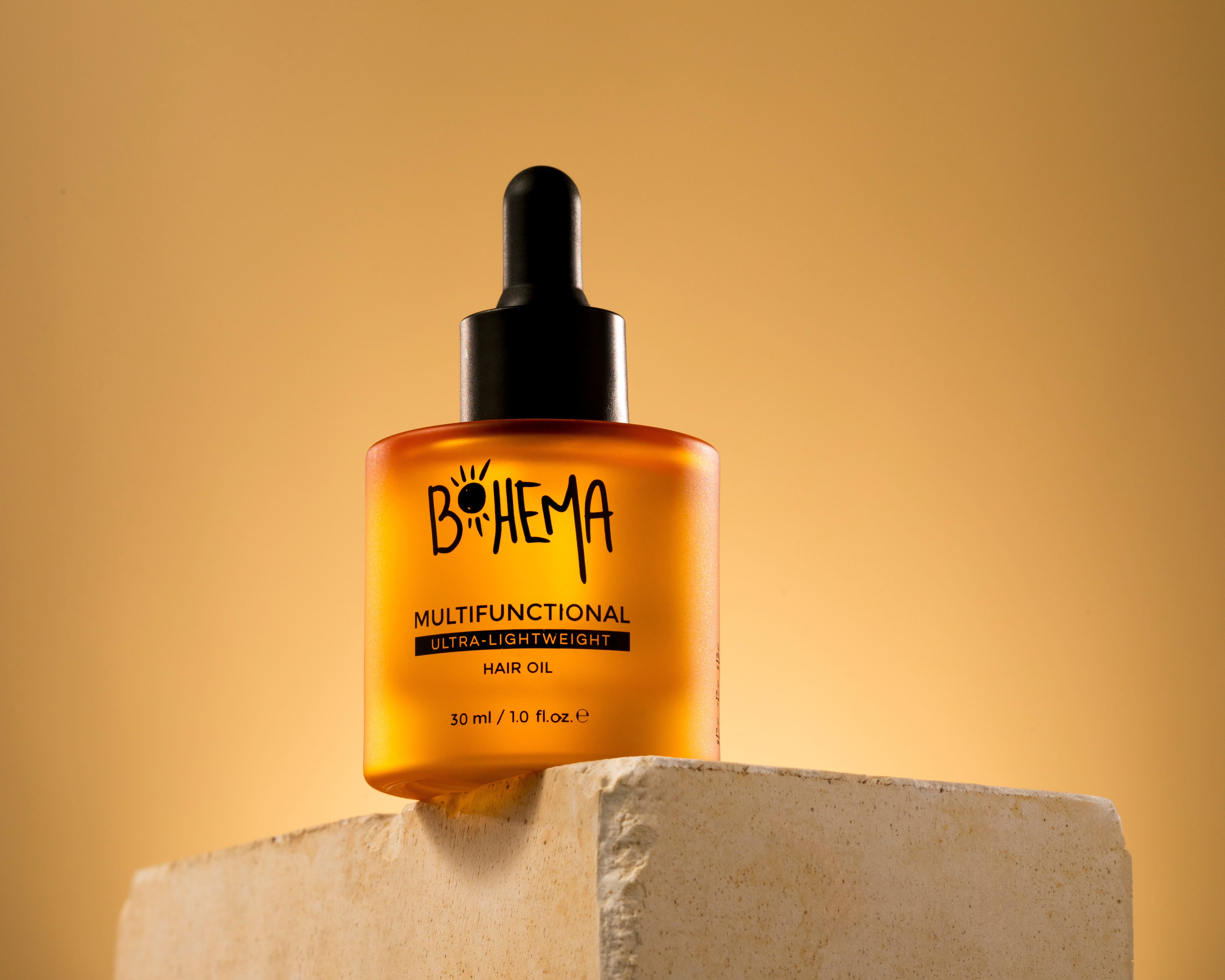 BOHEMA HAIR bottle in soft warm background